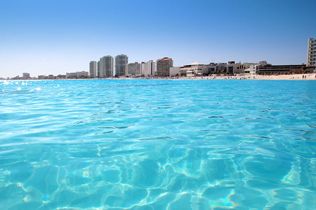 Cancun beach view from turquoise Caribbean