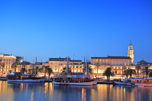 Split harbour depicting Diocletian's palace, by night